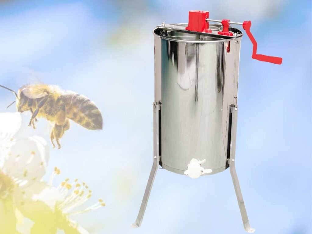 Beekeepers at The Agricultural Cooperative using a 3-Frame Manual Honey Extractor in a case study to showcase efficient honey harvesting for larger-scale apiaries