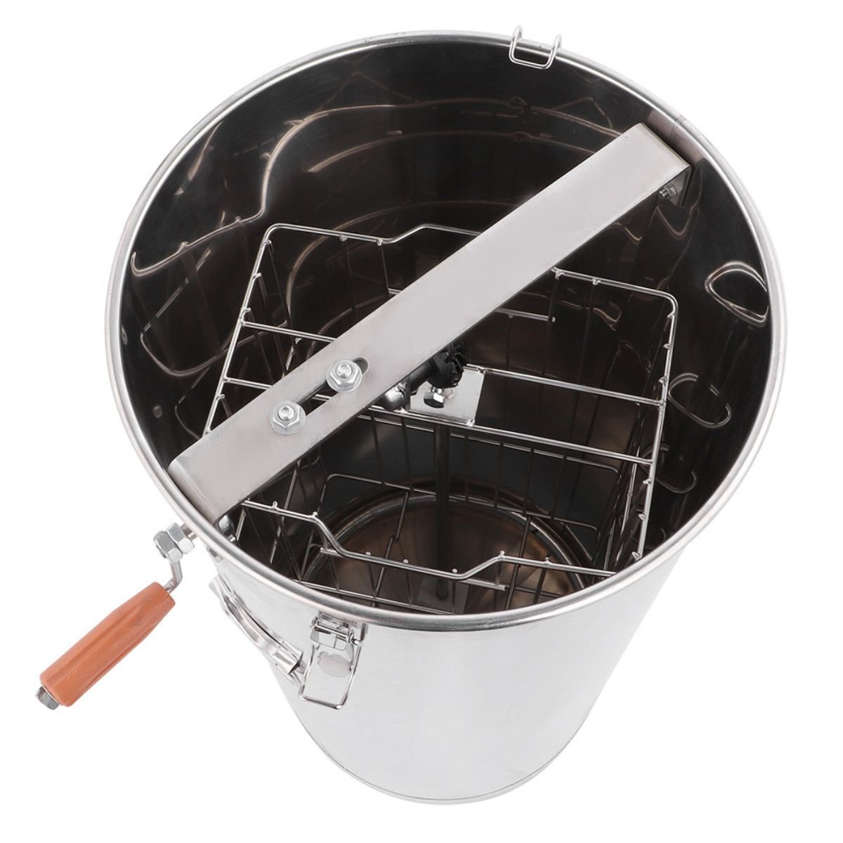 Interior top view of the reinforced two-frame basket inside the stainless honey extractor