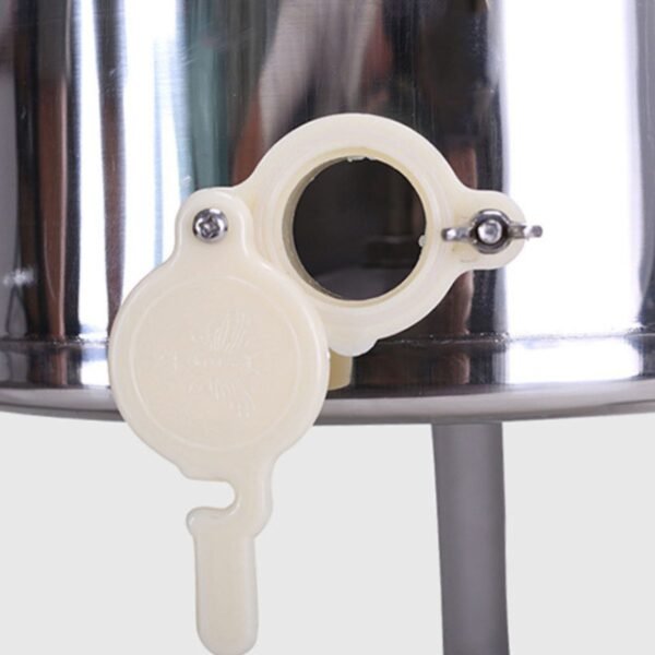 Clear lid and adjustable stand on Ø40×65 cm stainless extractor; 25 cm clearance for buckets under the gate