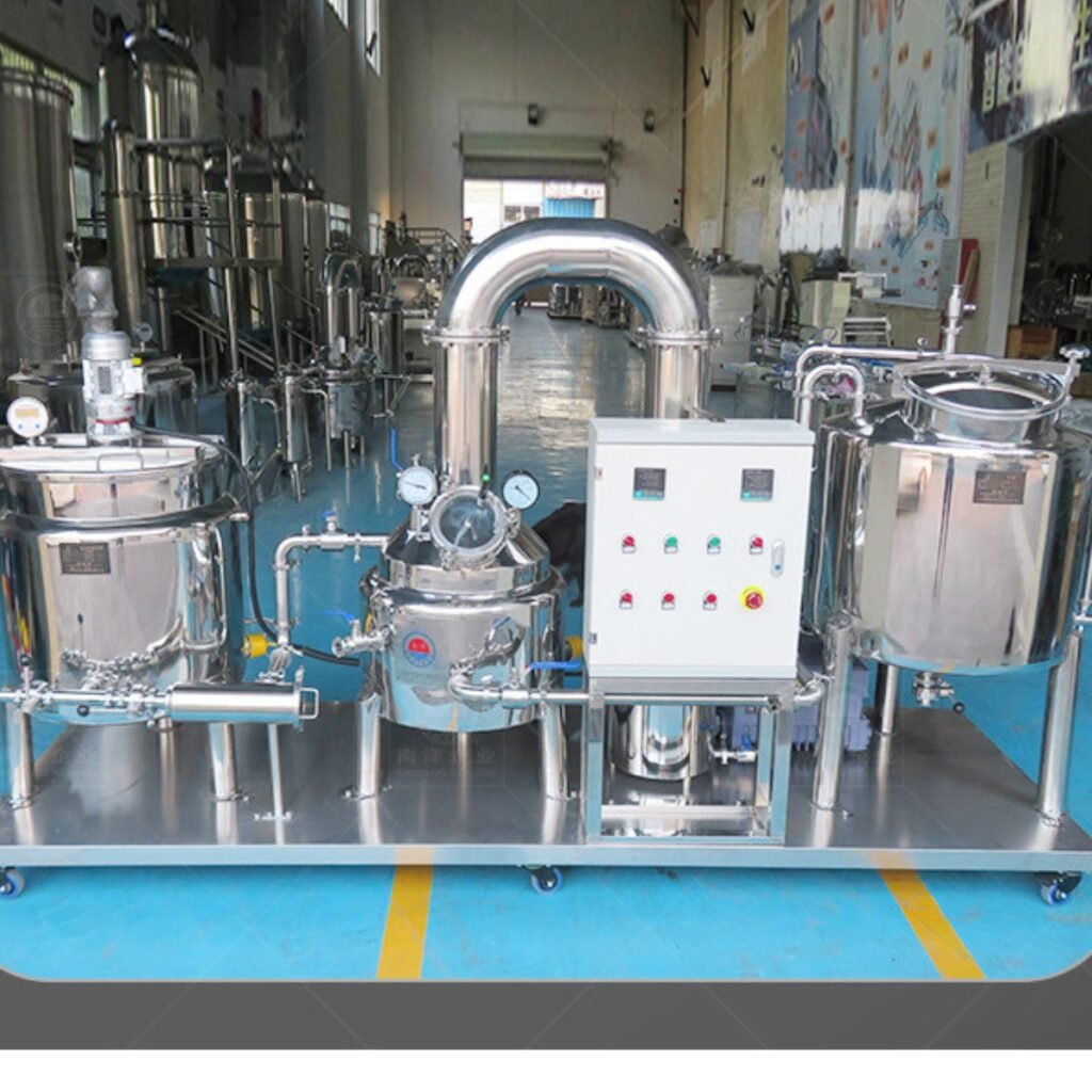 Honey processing line with low-temperature vacuum concentrator, 304 stainless tanks, condenser loop, and control cabinet on casters — BuzzBeeEquip
