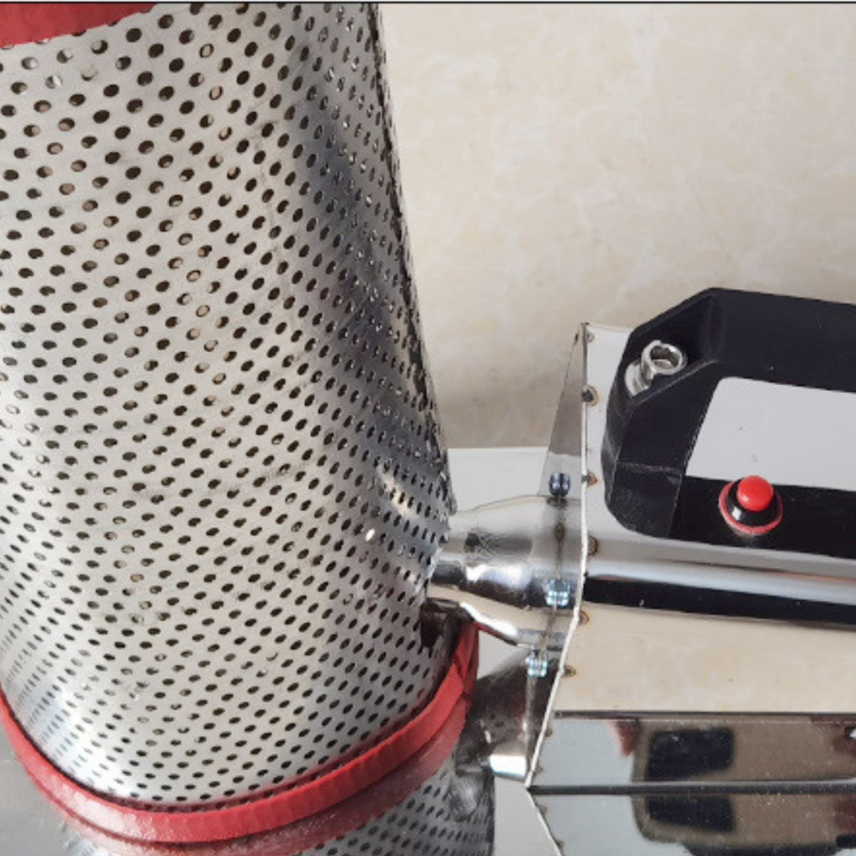 Detail of fan inlet and red power switch connecting the battery to the smoker body on BBE-EBS-01