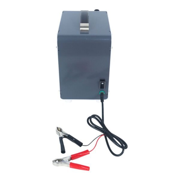 Rear view of honey pump showing dual power input with 24V battery clips and AC 100–240V connector