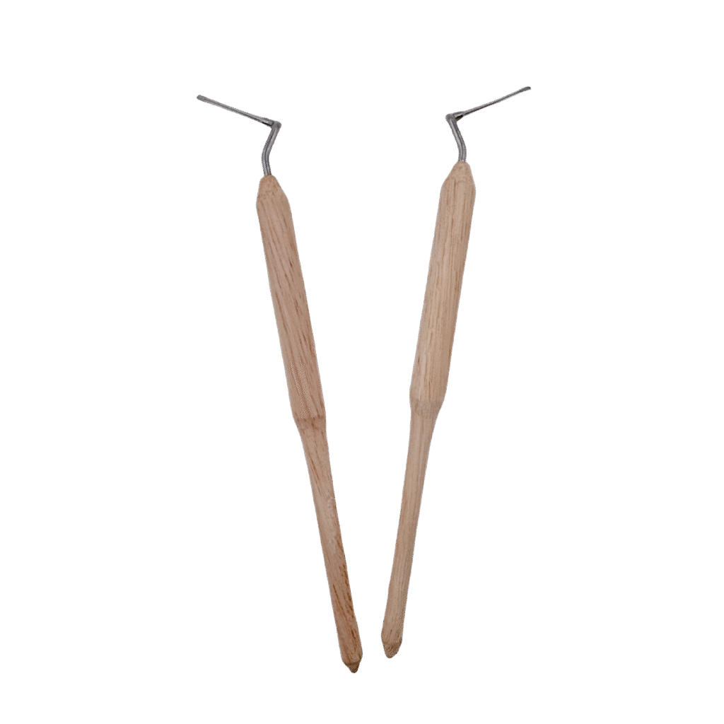 Wooden spatula bee scraping pen used as a precision queen rearing grafting tool and royal jelly scraper for beekeeping